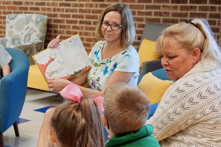 <p>BPS101 Superintendent Dr. Lisa Hichens reading a book to HCS kindergarten students … and BPS101 Board Member Sue Locke.</p>
